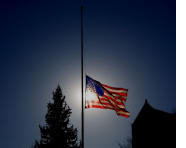 Half Staff For America As The Sun Sets On A Dream.